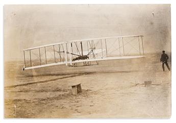 (AVIATION.) [John T. Daniels, photographer.] Photograph of the famous first flight at Kitty Hawk.                                                